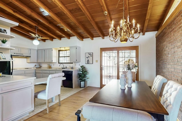 dining area with light wood-type flooring, ceiling fan with notable chandelier, lofted ceiling with beams, brick wall, and wood ceiling