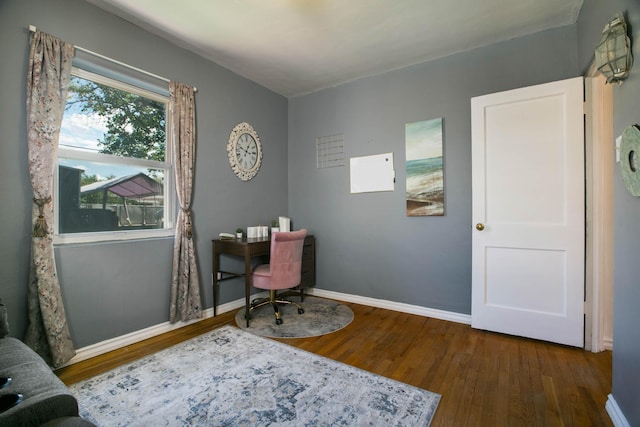 office area featuring hardwood / wood-style flooring and baseboards