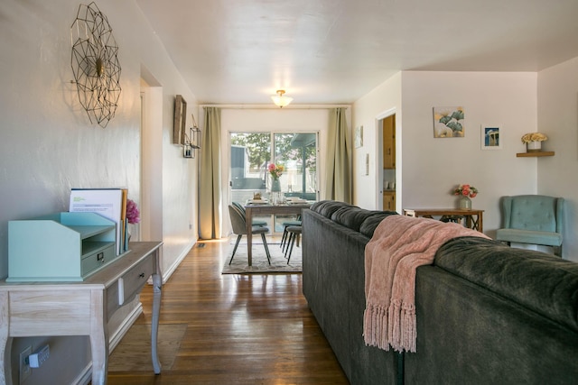 living area with dark wood-type flooring