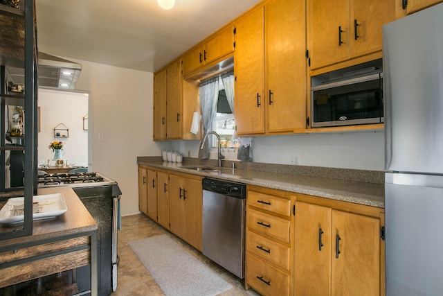 kitchen featuring a sink and stainless steel appliances