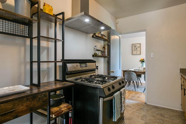 kitchen featuring island exhaust hood, open shelves, and gas range