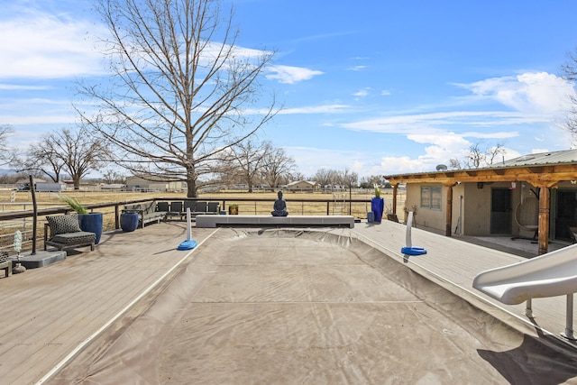 view of patio featuring a wooden deck