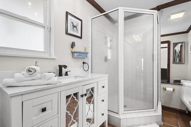 bathroom with a stall shower, ornamental molding, and vanity