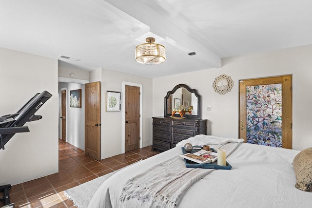 tiled bedroom with beam ceiling and visible vents