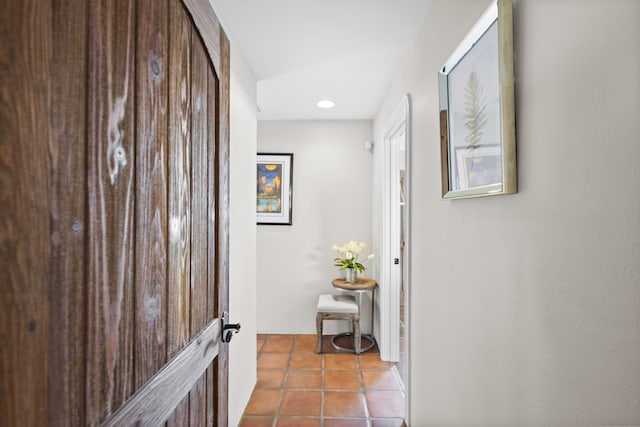 corridor with tile patterned flooring