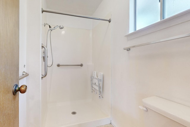 bathroom featuring a stall shower