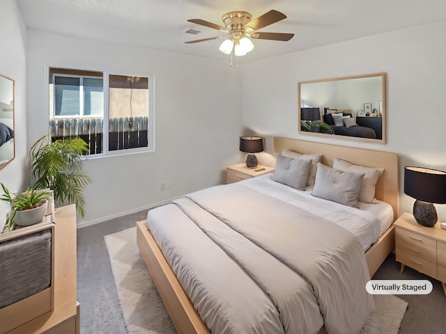 bedroom featuring ceiling fan, carpet, visible vents, and baseboards