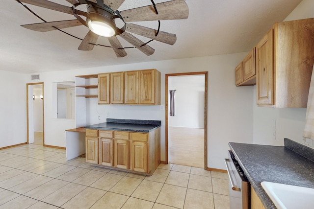 kitchen featuring dark countertops, visible vents, dishwasher, light tile patterned floors, and open shelves