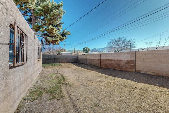 view of yard featuring a fenced backyard