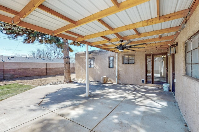 view of patio / terrace with fence and ceiling fan