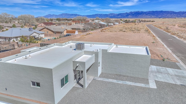 birds eye view of property with a residential view and a mountain view