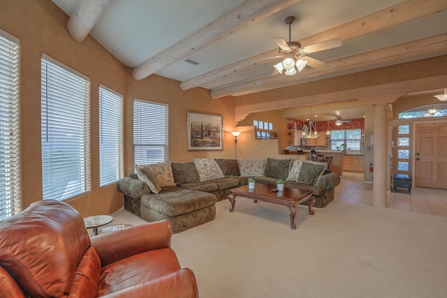 living room featuring visible vents, beam ceiling, light carpet, a ceiling fan, and light tile patterned floors