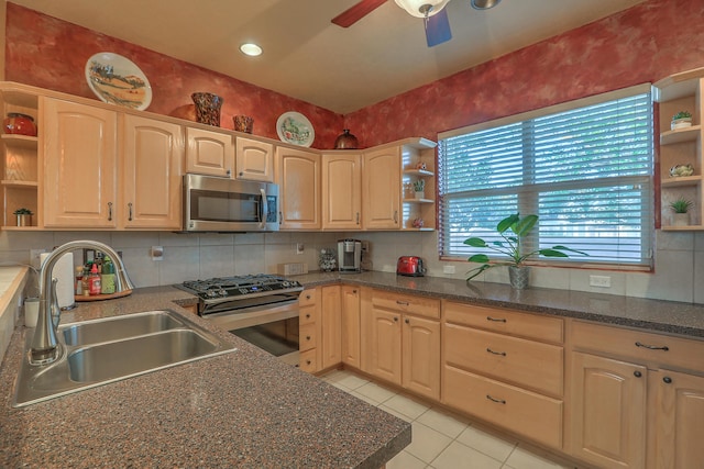 kitchen featuring a sink, open shelves, light tile patterned flooring, and stainless steel appliances