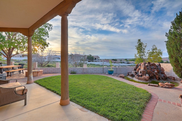 view of yard featuring a patio and fence