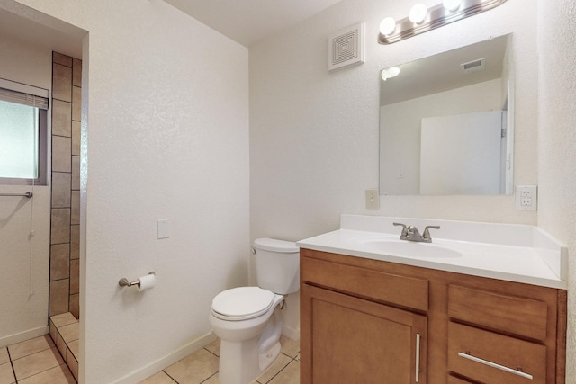 bathroom with tile patterned floors, visible vents, toilet, and vanity