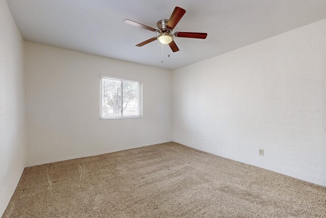 1505 Walter St SE, Albuquerque, NM 87102 - empty room featuring carpet and a ceiling fan