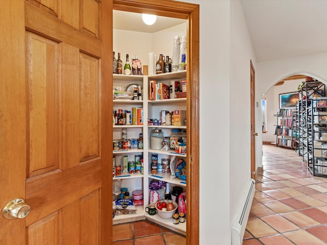 storage area with baseboard heating