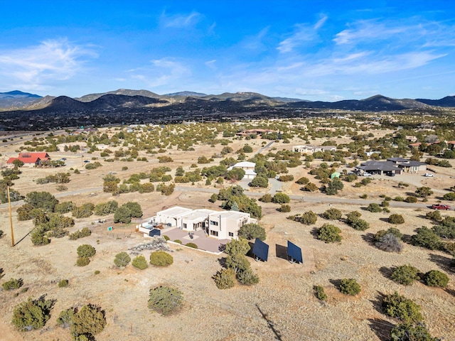 bird's eye view with a mountain view