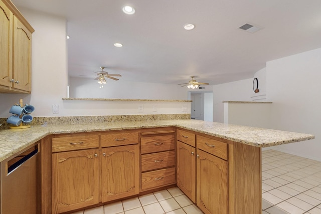 kitchen with light tile patterned floors, visible vents, a peninsula, and ceiling fan