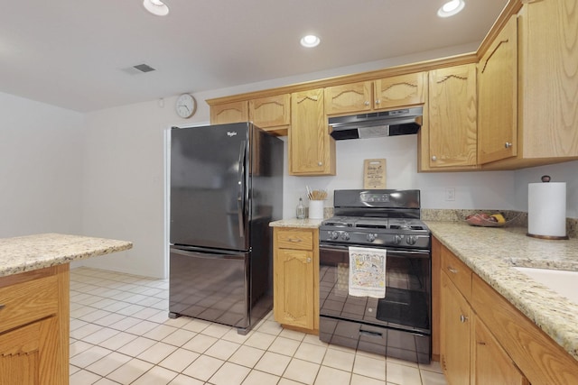 kitchen featuring under cabinet range hood, visible vents, black appliances, and recessed lighting