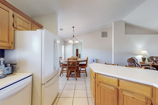 kitchen featuring light tile patterned flooring, visible vents, light countertops, and vaulted ceiling