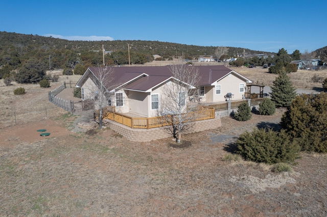 birds eye view of property with a mountain view