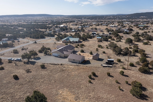 bird's eye view featuring view of desert and a mountain view