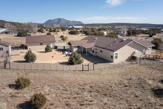 drone / aerial view featuring a mountain view