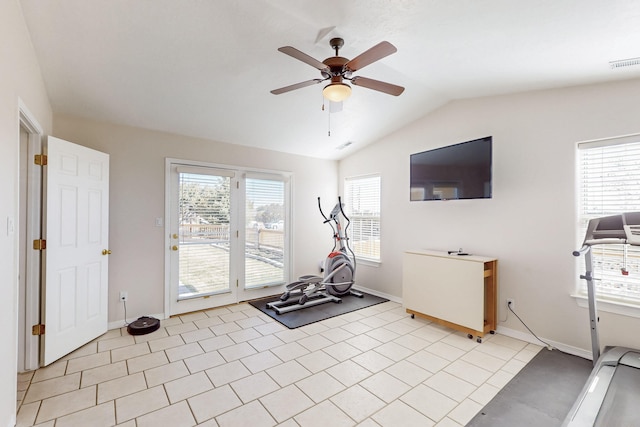 exercise area featuring light tile patterned floors, baseboards, visible vents, ceiling fan, and vaulted ceiling