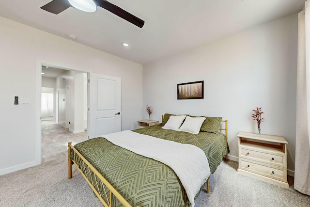 bedroom featuring recessed lighting, baseboards, light carpet, and a ceiling fan