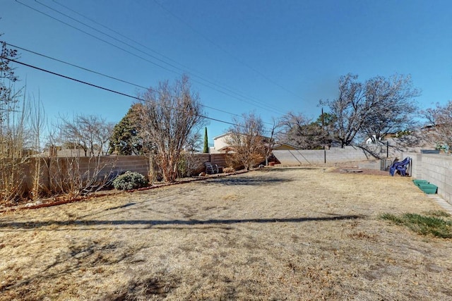 view of yard featuring a fenced backyard