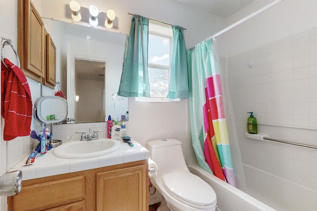 full bath featuring vanity, shower / bath combination with curtain, toilet, and backsplash