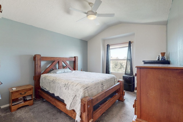 carpeted bedroom with a ceiling fan and lofted ceiling