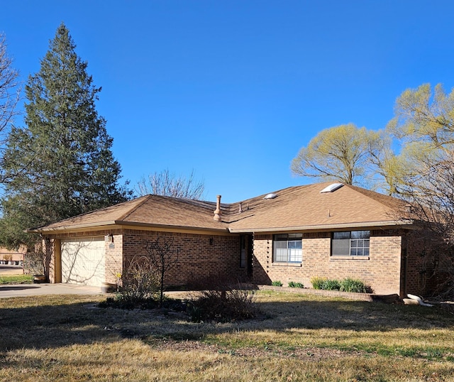 view of home's exterior with a garage, brick siding, driveway, and a lawn