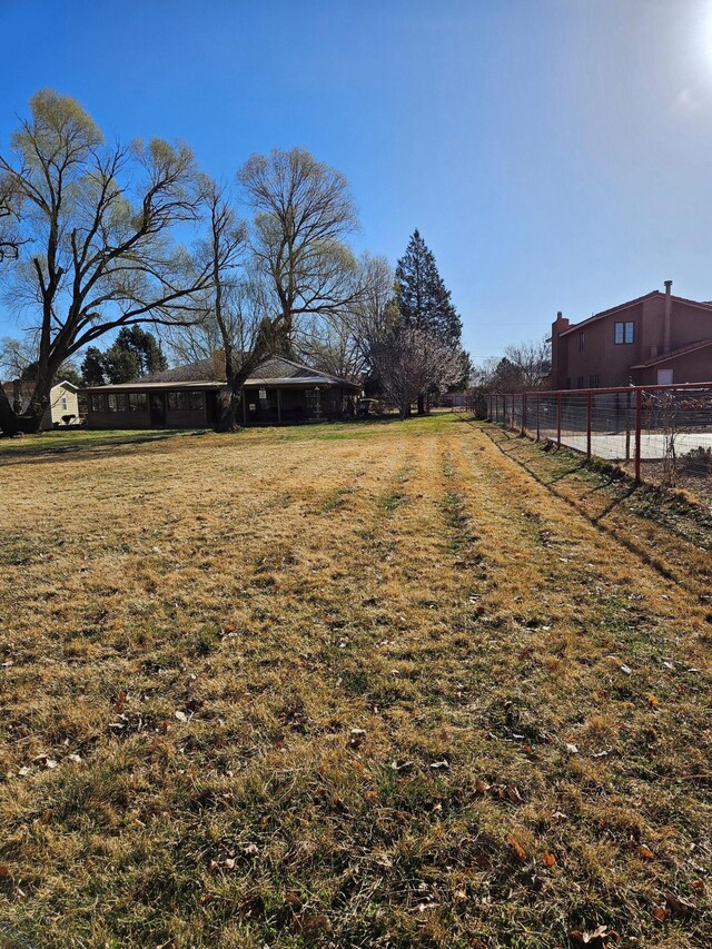 view of yard with fence