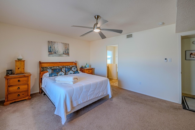 bedroom featuring visible vents, baseboards, a ceiling fan, and carpet flooring