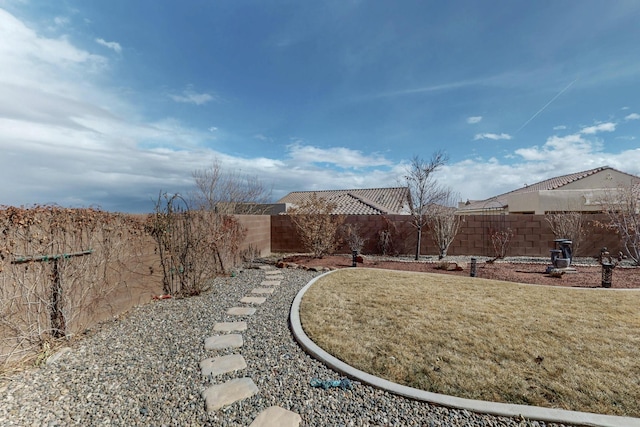 view of yard featuring a fenced backyard