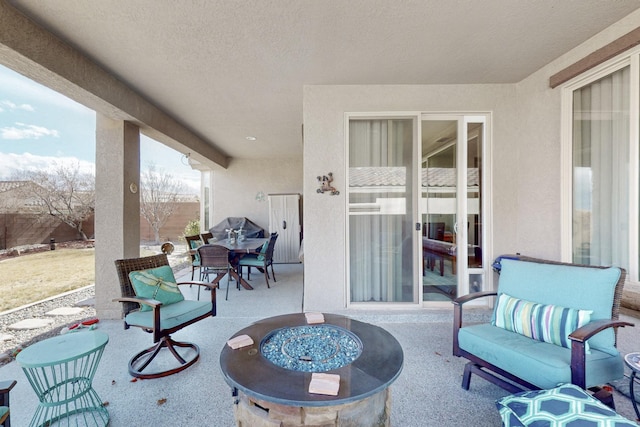 view of patio featuring outdoor dining area