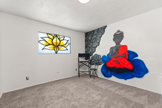 interior space with baseboards, carpet, and a textured ceiling