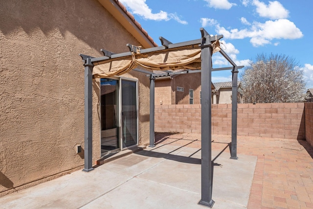 view of patio / terrace with fence