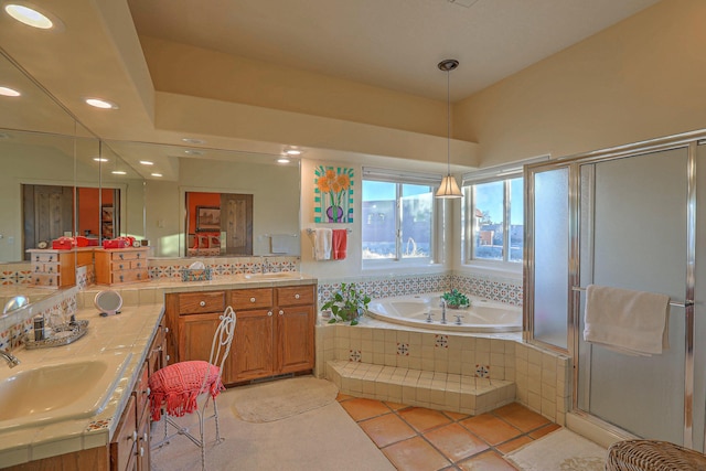 bathroom featuring a stall shower, recessed lighting, tile patterned flooring, a bath, and vanity