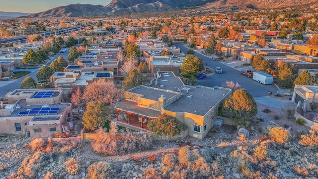 aerial view with a mountain view and a residential view