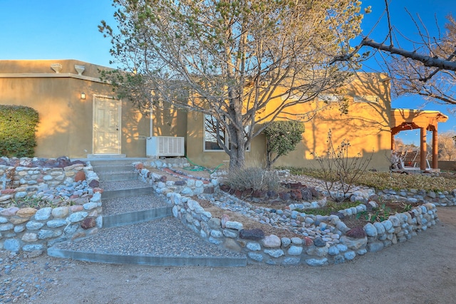 view of pueblo revival-style home