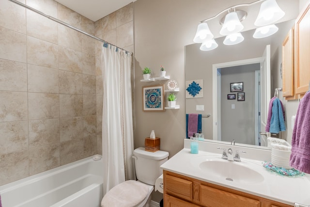 full bathroom featuring vanity, a notable chandelier, shower / tub combo, and toilet