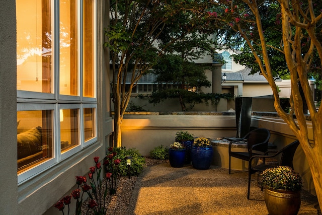 view of patio featuring a balcony