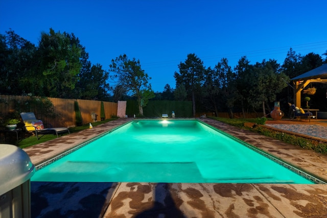 view of pool with a patio area, a fenced in pool, and a fenced backyard