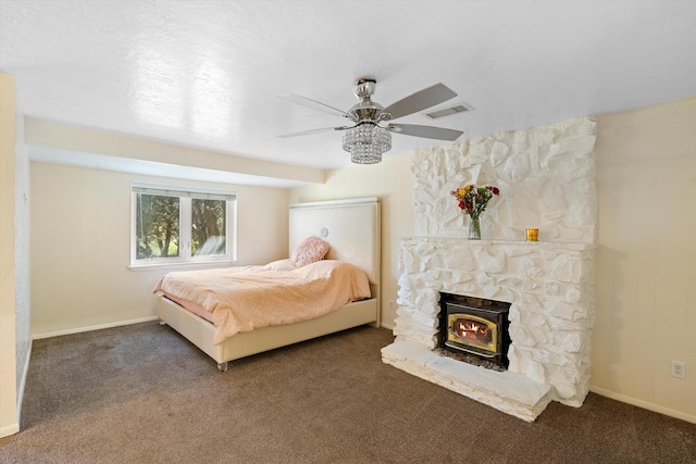 bedroom featuring visible vents, baseboards, carpet, and a ceiling fan