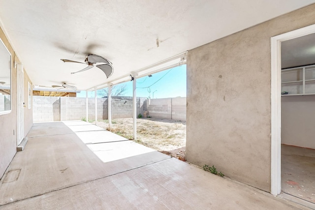 view of patio / terrace with a fenced backyard and a ceiling fan