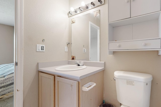 half bath with toilet and vanity