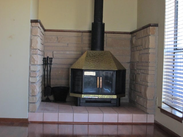 interior details featuring a wood stove